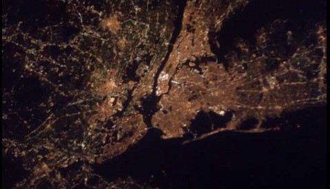 View of a city at night taken from space