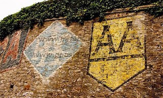 AA and RAC ghostsigns by James Deans Hand painted advertising on a building for various motoring brands
