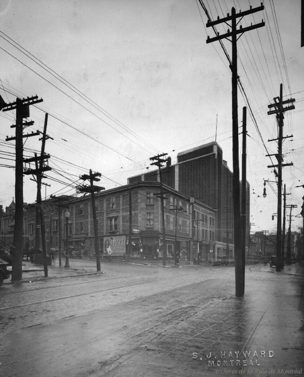 Montréal street scene with ghostsign in archival image