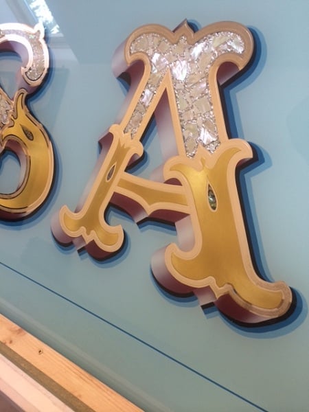 Painted and gilded signage for Casa Blue bar