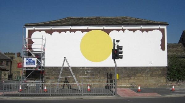 Work in progress on restoration for painted wall sign for Larkspur Drinks