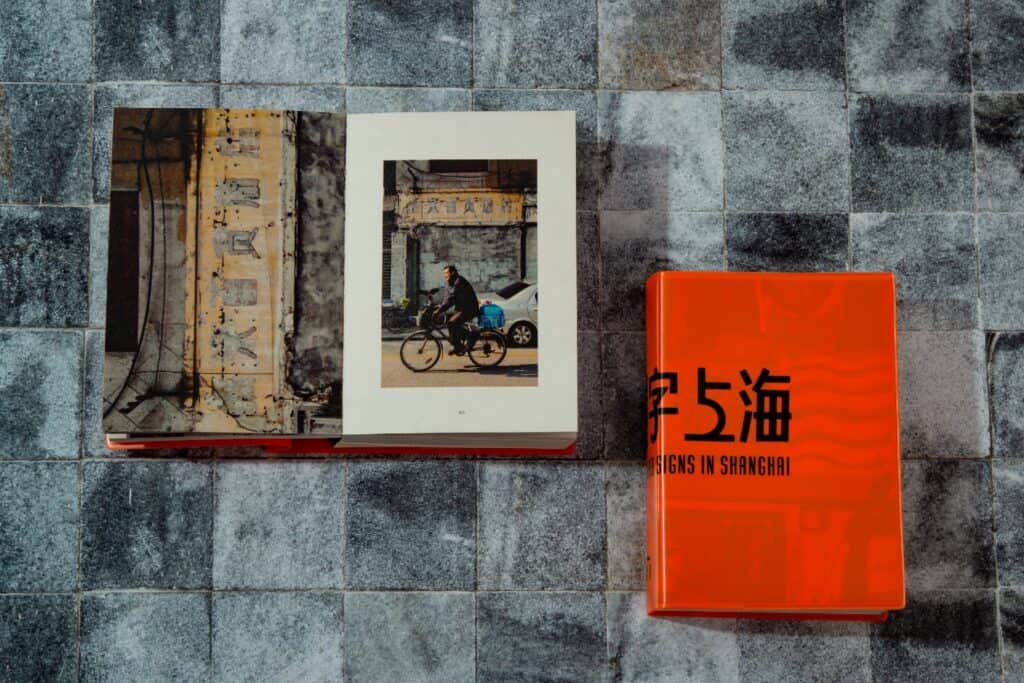 Cover and inside spread of the book Uncovered Signs in Shanghai.