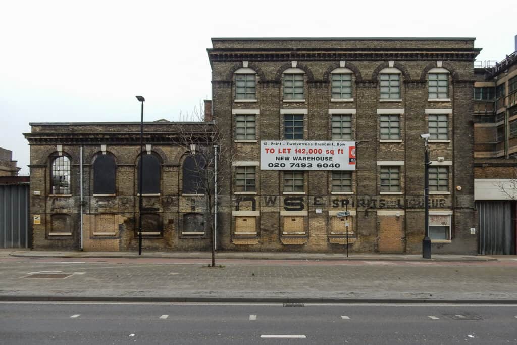 Painted sign on old London industrial buildings.
